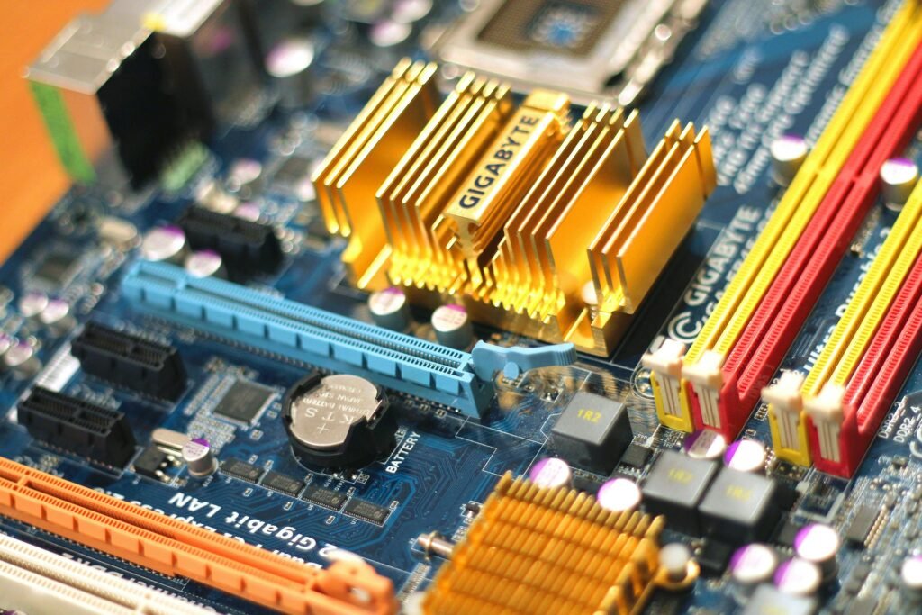 Detailed close-up of a computer motherboard showcasing various electronic components.